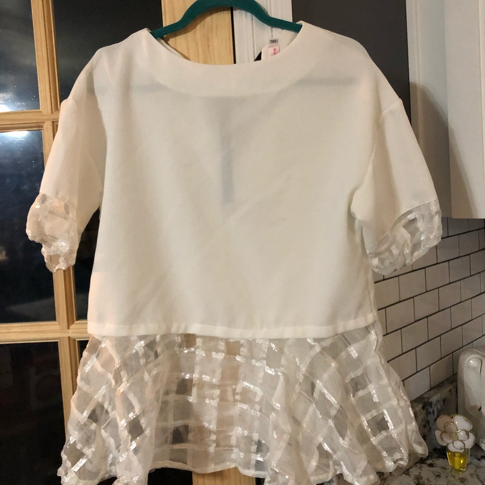 White peplum top